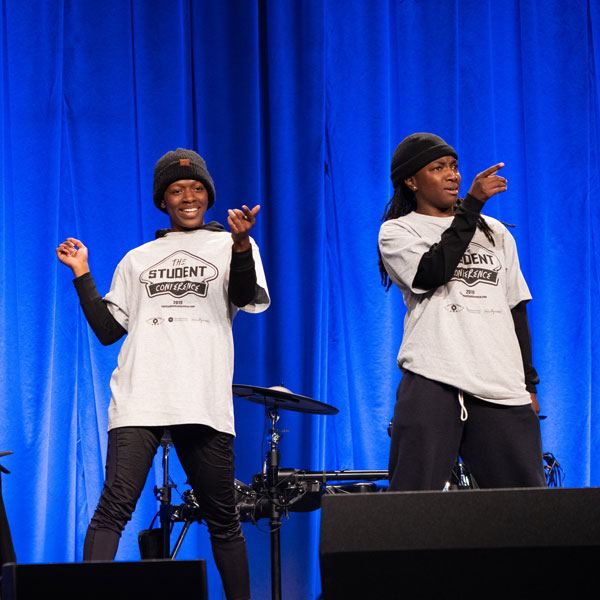 Two students dancing