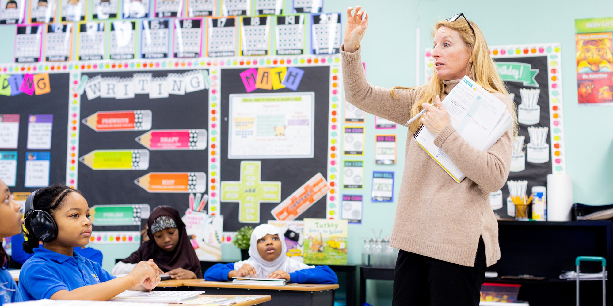 teacher in front of students in the classroom