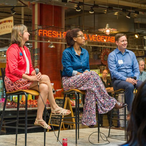 speakers on stage at the Midtown Global Market