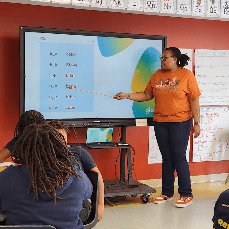 teacher in front of her class