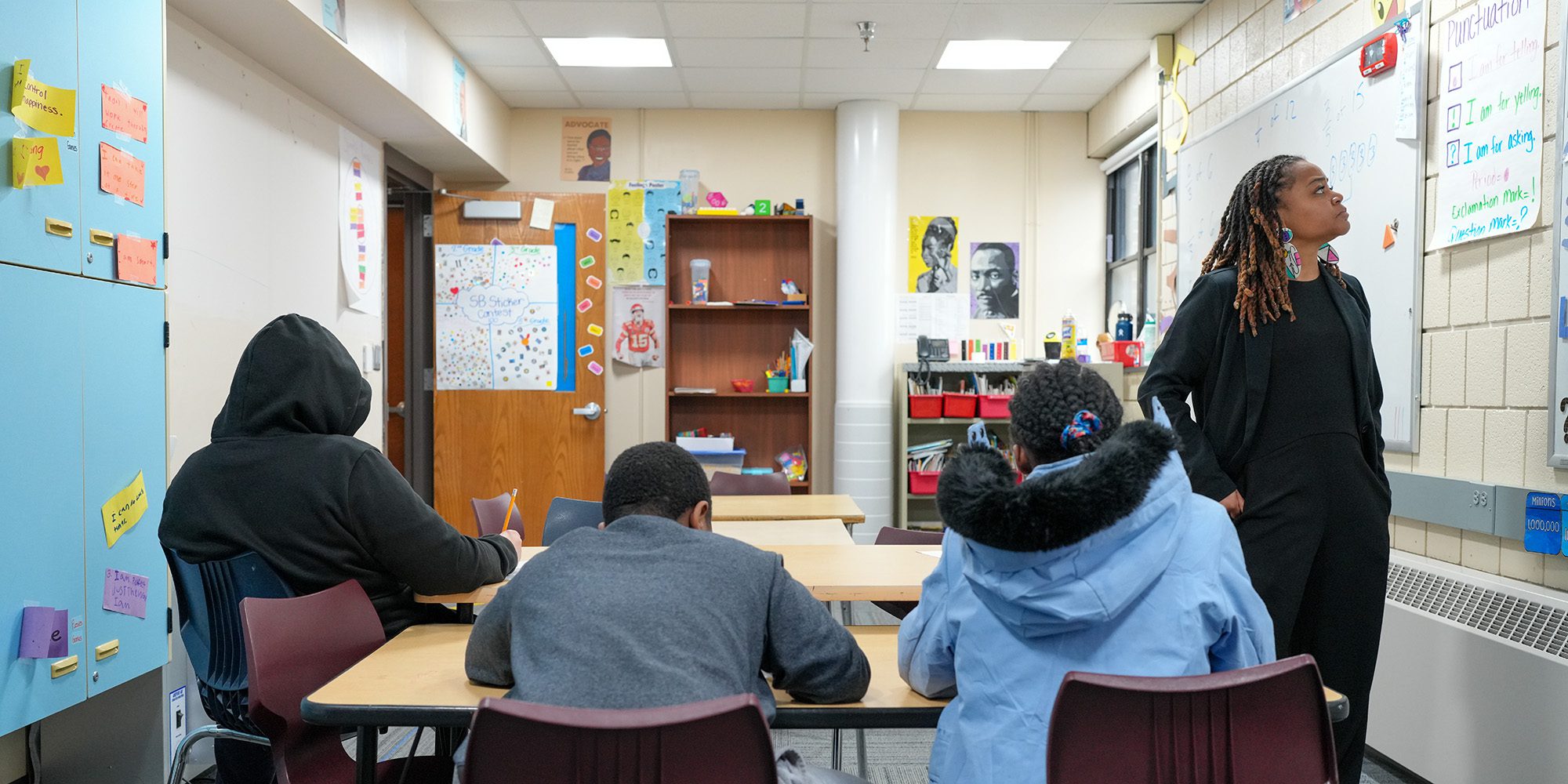 teacher in front of her students